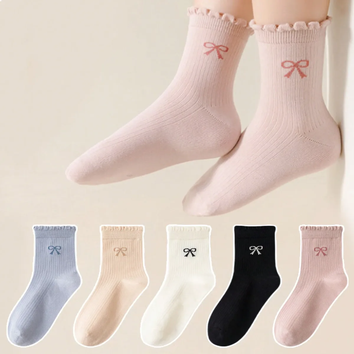 Chaussettes mi-mollet à nœuds en dentelle pour fille