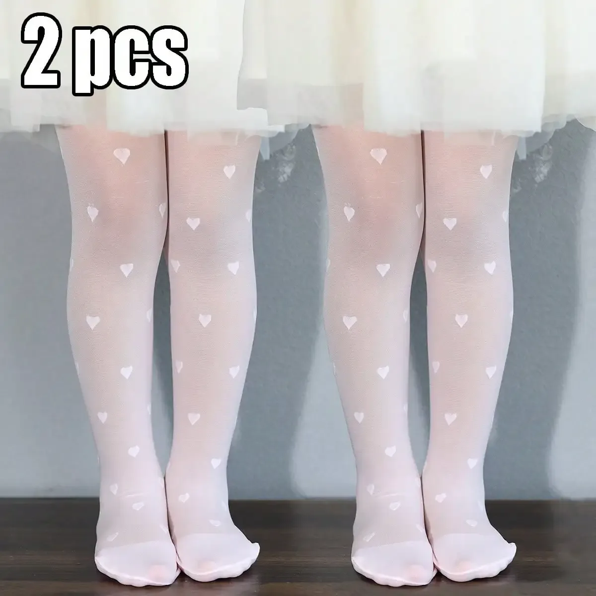 Collants blancs fins à motif de cœur pour fille